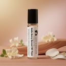 Reveal Type Perfume Body Oil for Women bottle with pale pink oil, black cap, Cathy’s New Look label