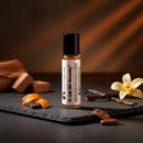 Perfume oil bottle by Cathy,s new look; resembles Givenchy PI AIR, amber liquid in a tiny glass bottle with black cap.