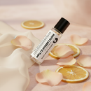 PATTI LABELLE (L) Type perfume oil bottle with black cap and Cathy’s New Look branding.
