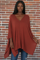 Plus brushed melange sweater in fired brick by Zenana; oversized draped V-neck top.