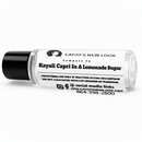Kayali Capri Lemon Sugar body oil fragrance bottle, clear glass with black cap and Cathy’s New Look branding.