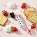 Body mist Strawberry Pound Cake by Cathy Burgess Shop in a clear glass bottle with a black cap.